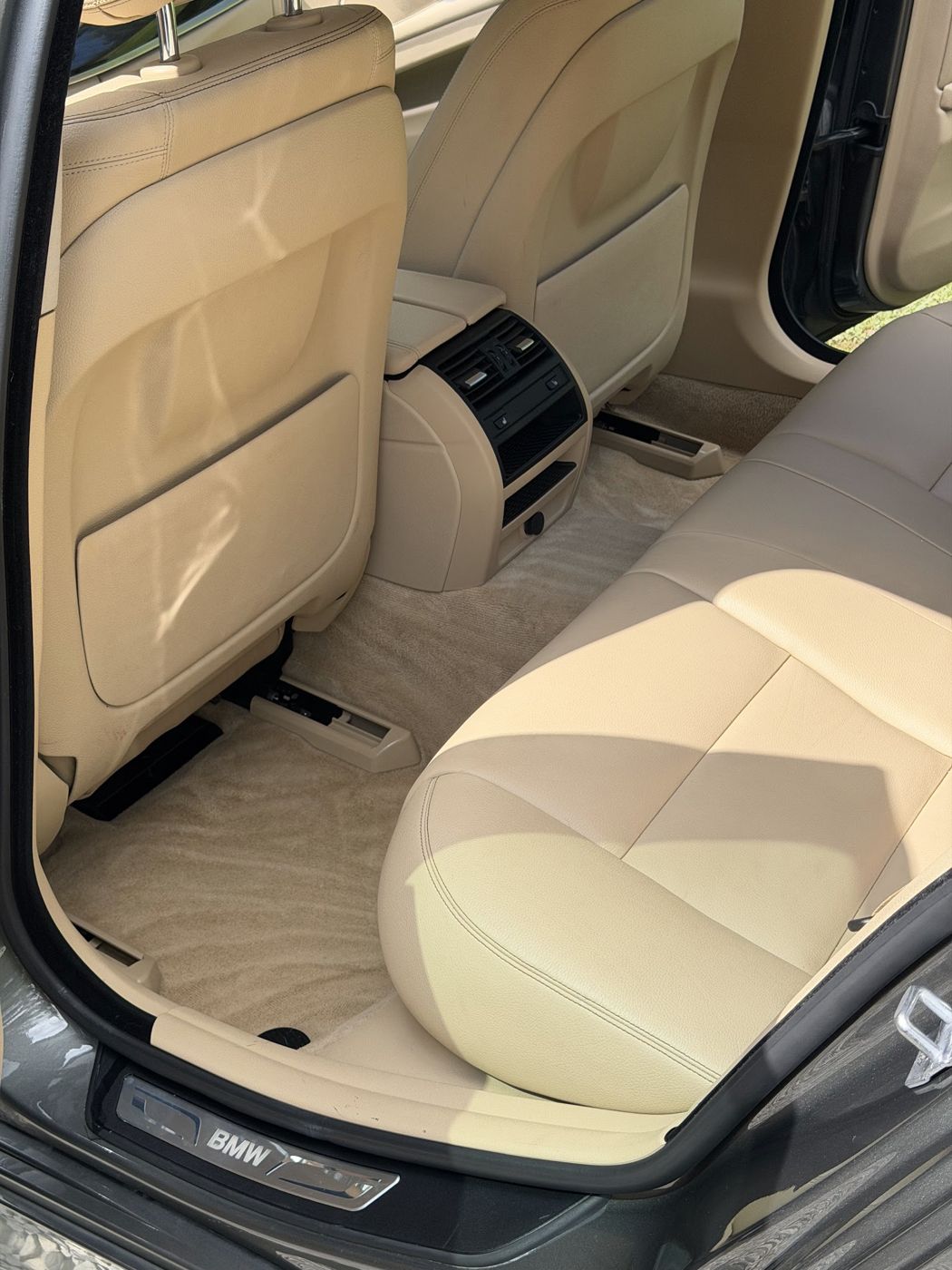 Cream leather rear seats cleaned and conditioned